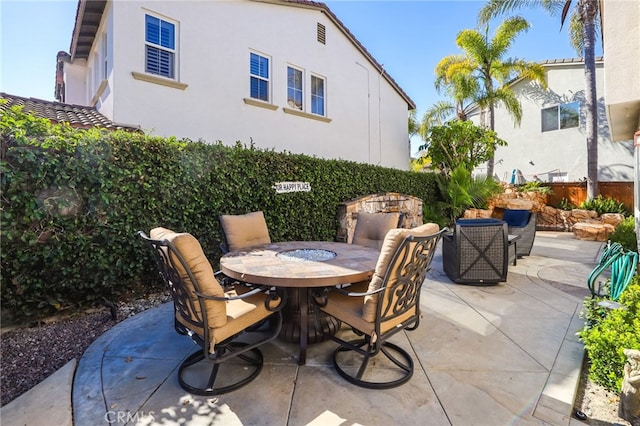 view of patio with outdoor dining space