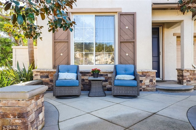 view of patio / terrace featuring fence