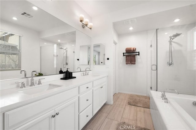 166 Natal Rd, Rancho Mission Viejo, CA 92694 - bathroom with a shower stall, double vanity, a bath, and recessed lighting