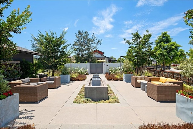 166 Natal Rd, Rancho Mission Viejo, CA 92694 - view of patio with outdoor lounge area and a gate