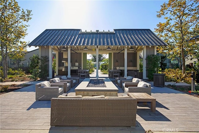 166 Natal Rd, Rancho Mission Viejo, CA 92694 - view of patio / terrace featuring an outdoor living space with a fire pit, a deck, and a ceiling fan