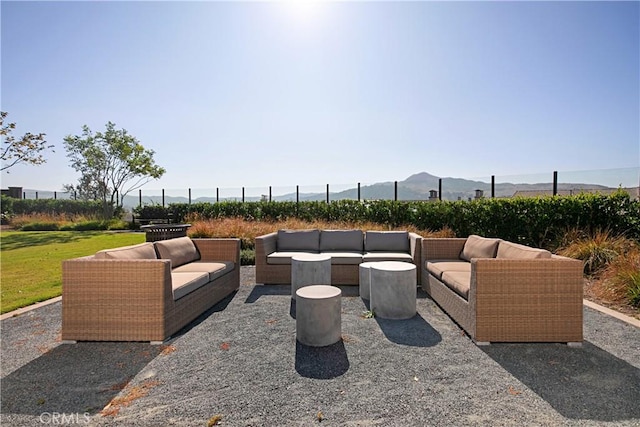 view of patio / terrace with outdoor lounge area and a mountain view