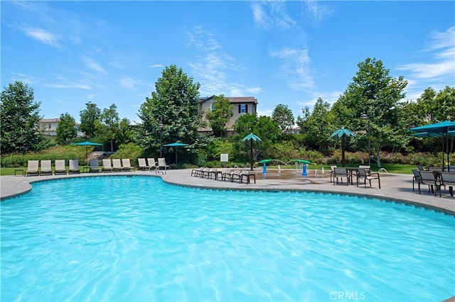 pool with a patio