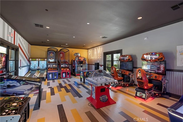 rec room with visible vents, french doors, and recessed lighting