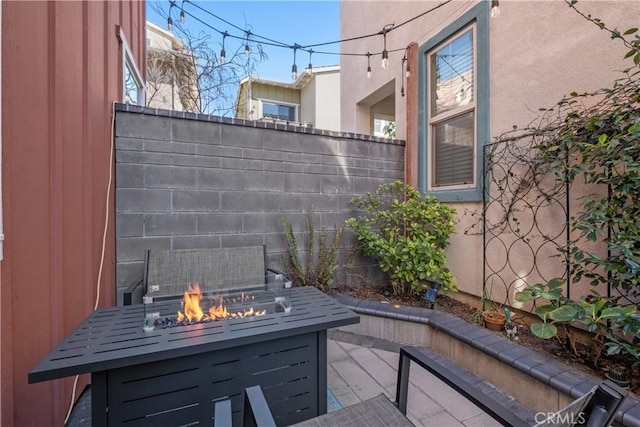 166 Natal Rd, Rancho Mission Viejo, CA 92694 - view of patio / terrace with a fire pit and fence