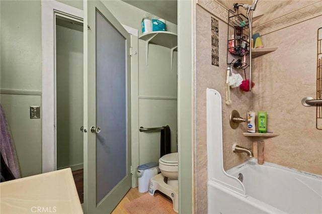 full bath featuring shower / washtub combination and toilet