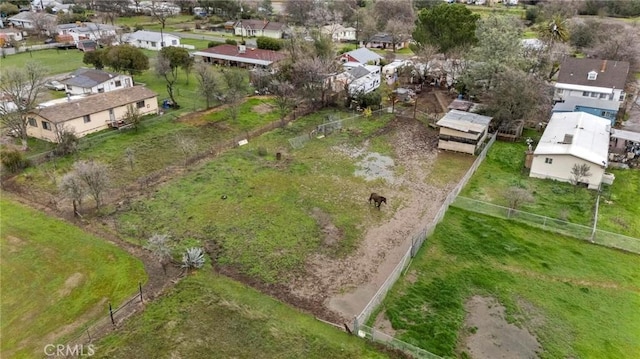 birds eye view of property with a residential view