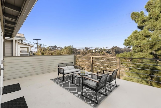 view of patio / terrace featuring a balcony