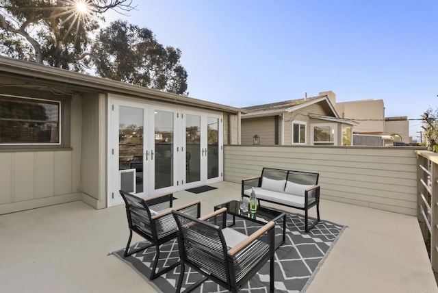 view of patio featuring an outdoor hangout area and french doors