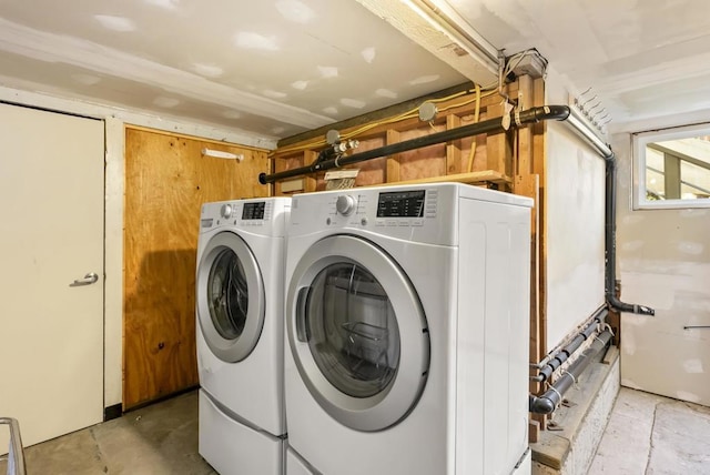 laundry room featuring laundry area and washer and clothes dryer