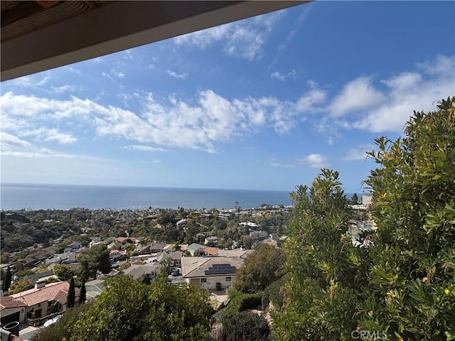 exterior space with a water view