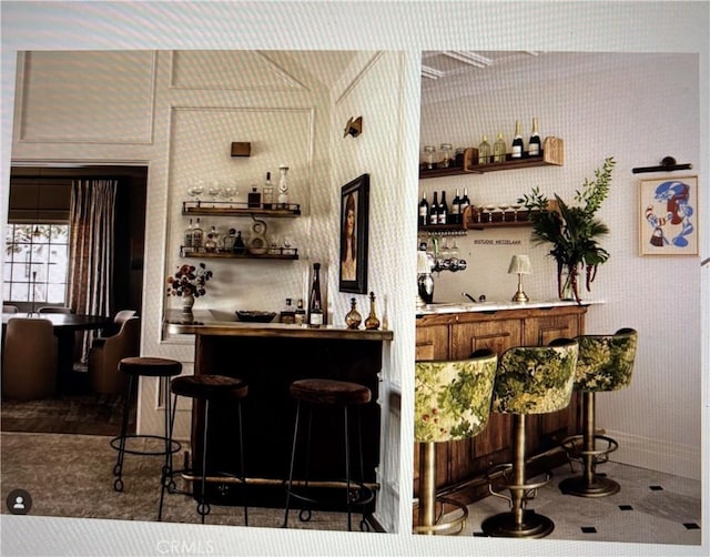 bar with indoor bar and wallpapered walls