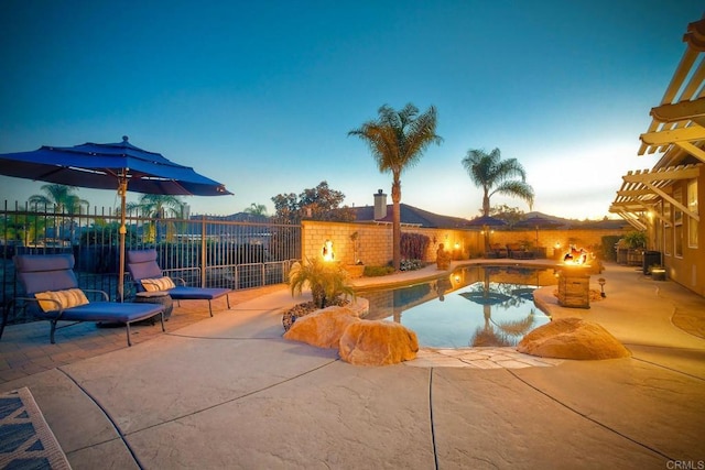 view of swimming pool with a fenced in pool, a fenced backyard, and a patio area