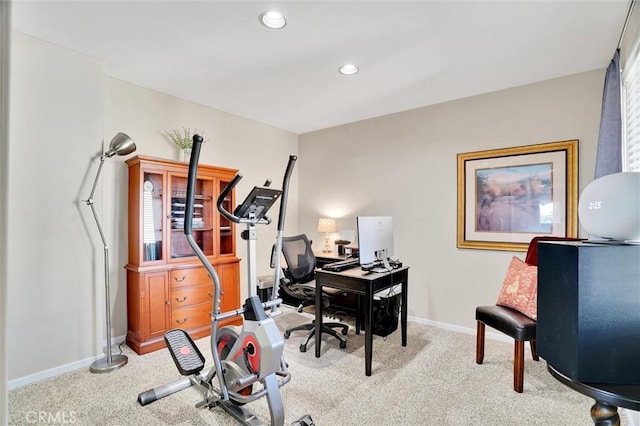 carpeted office with recessed lighting and baseboards