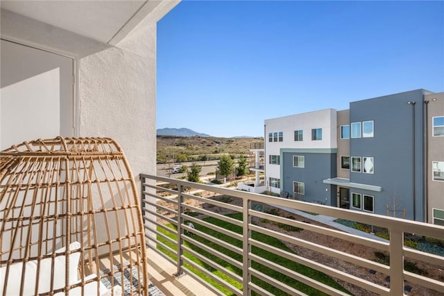 balcony featuring a mountain view