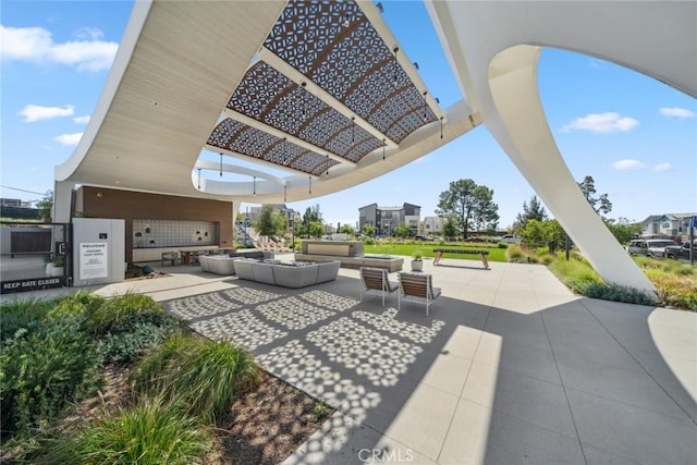 view of patio / terrace with an outdoor hangout area and a pergola