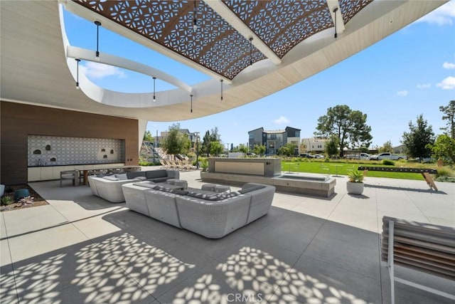 view of patio / terrace featuring outdoor lounge area and a pergola