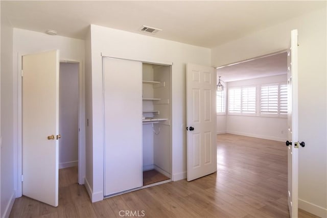 closet featuring visible vents