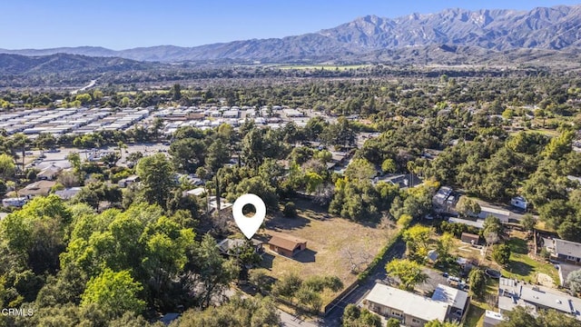 drone / aerial view featuring a mountain view