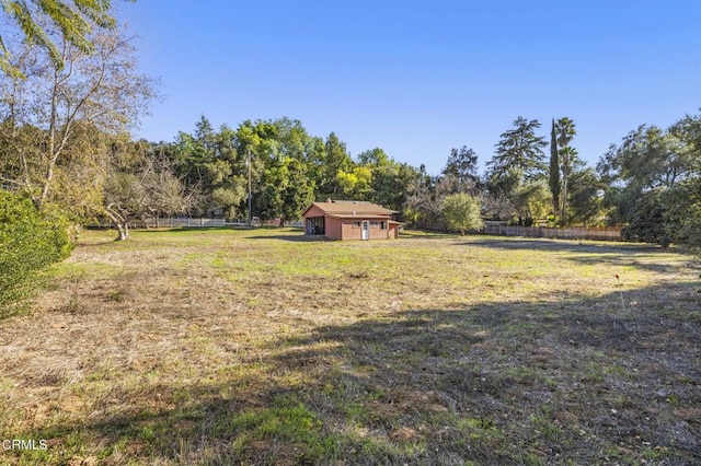 view of yard featuring fence