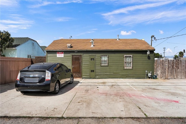 view of front of home with fence