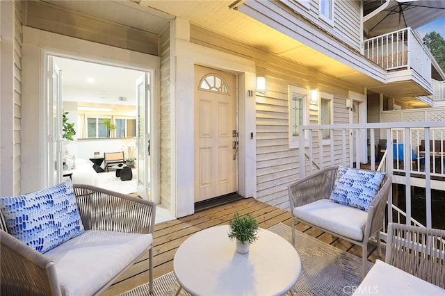 doorway to property featuring a balcony