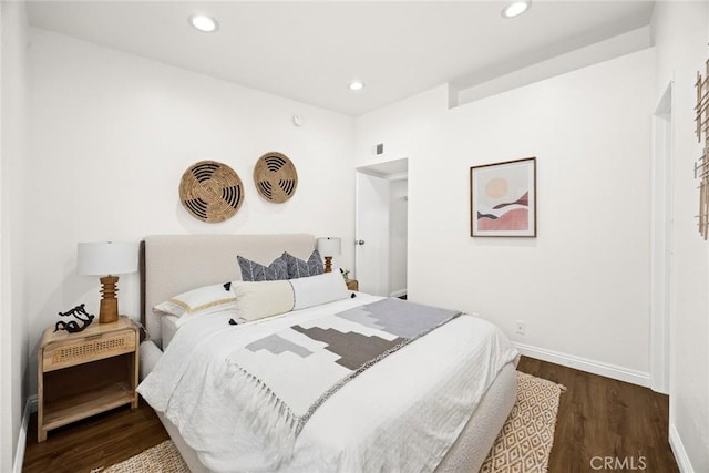 bedroom featuring recessed lighting, baseboards, and wood finished floors