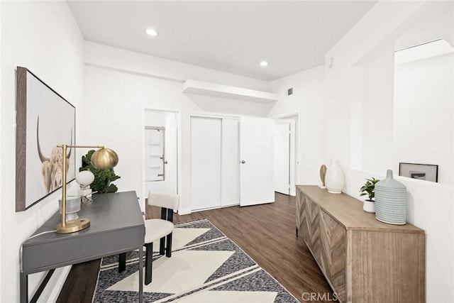 interior space featuring visible vents, dark wood finished floors, and recessed lighting