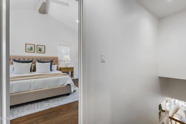 bedroom featuring high vaulted ceiling, a ceiling fan, wood finished floors, and beamed ceiling