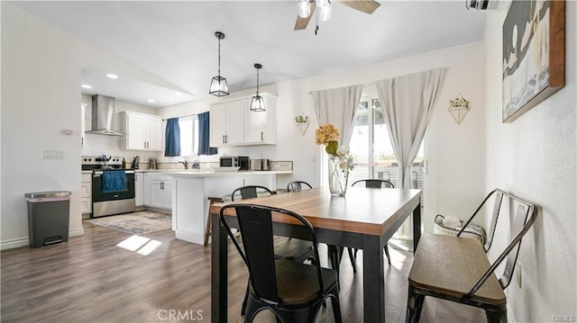 670 Ducor Ave, Landers, CA 92285 - dining space featuring light wood-style flooring, a ceiling fan, recessed lighting, and baseboards