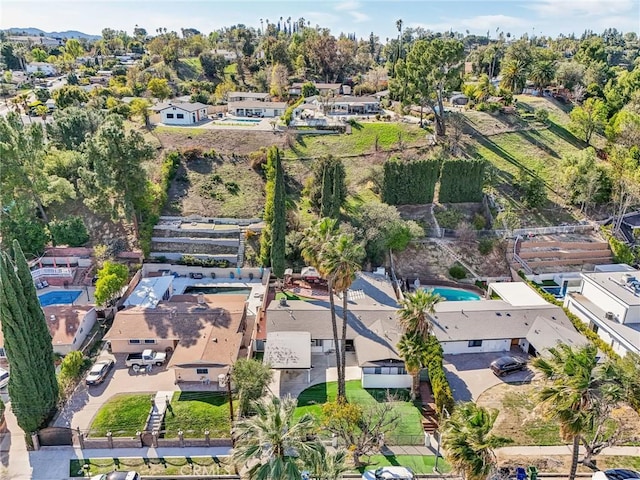 birds eye view of property with a residential view