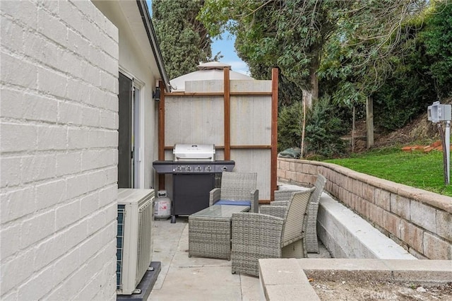 view of patio / terrace featuring central AC and area for grilling