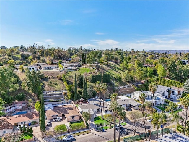 birds eye view of property with a residential view