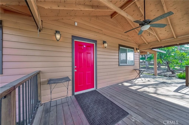 wooden deck featuring a ceiling fan