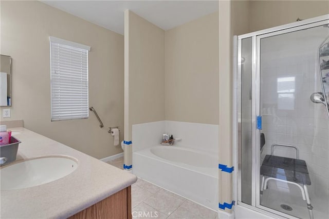 full bath featuring a shower stall, vanity, a bath, and tile patterned floors