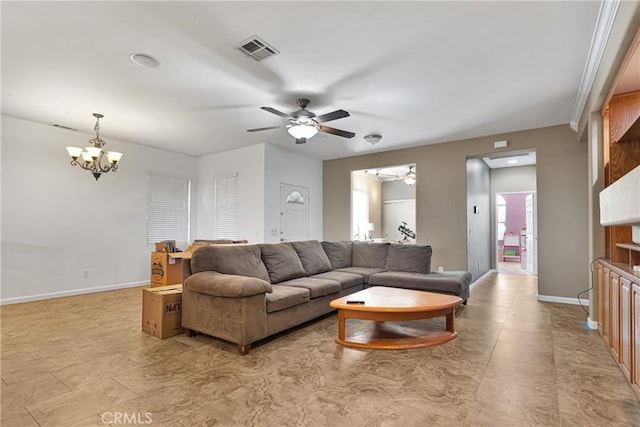 living room featuring visible vents, baseboards, and ceiling fan with notable chandelier