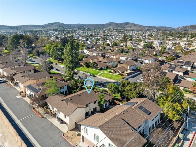 bird's eye view with a residential view and a mountain view