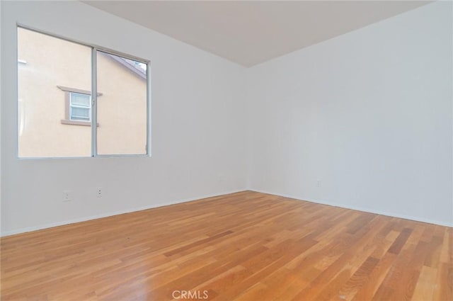 empty room featuring light wood-style flooring