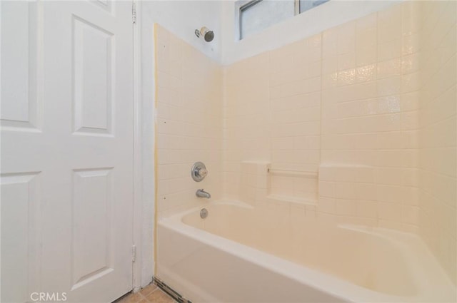 bathroom featuring bathtub / shower combination and tile patterned floors