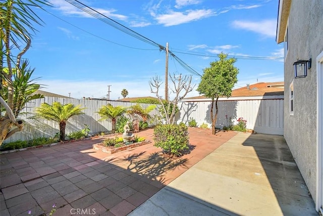 view of patio with a fenced backyard