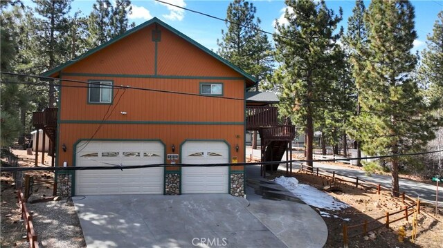 view of front of home featuring concrete driveway