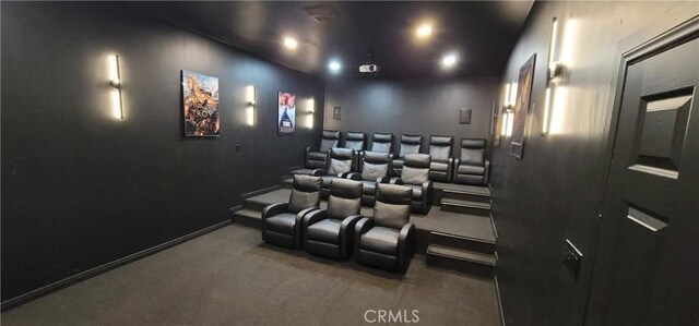 home theater with baseboards and carpet floors