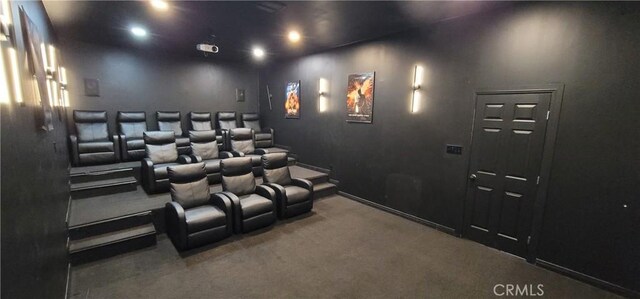 cinema room featuring carpet