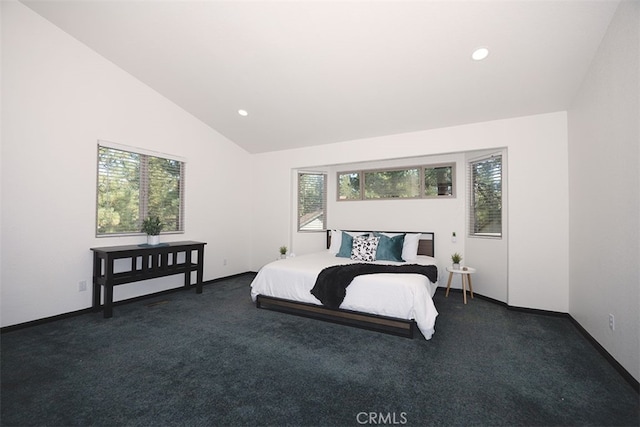 bedroom featuring multiple windows, dark carpet, vaulted ceiling, recessed lighting, and baseboards