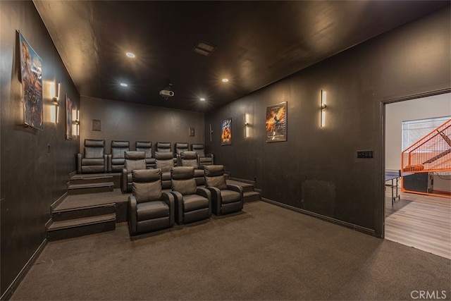 carpeted home theater featuring recessed lighting
