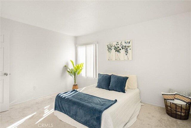 700 W La Veta Ave Unit I11, Orange, CA 92868 - bedroom with carpet floors and baseboards