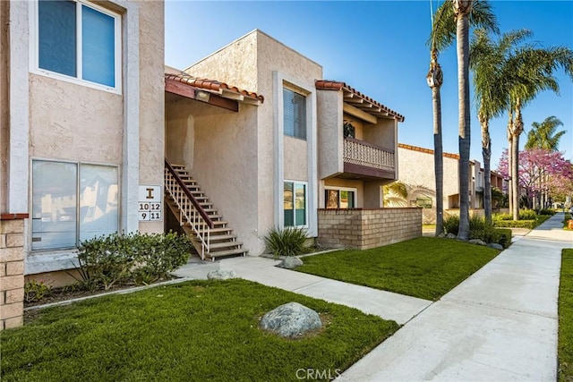 view of property with stairs