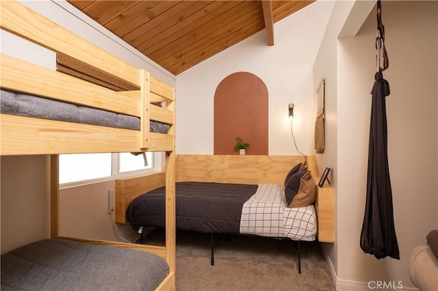 carpeted bedroom with lofted ceiling and wooden ceiling