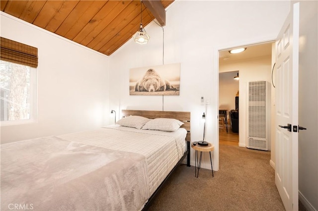 bedroom featuring carpet floors, a heating unit, vaulted ceiling, wooden ceiling, and baseboards