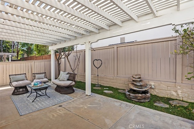 view of patio / terrace featuring a fenced backyard and a pergola